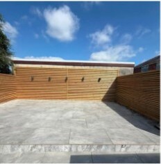 Modern enclosed stone patio